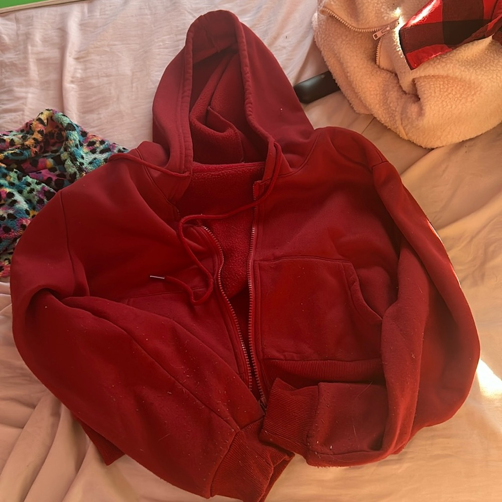 red cropped zip up